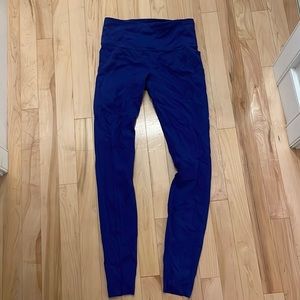 Lululemon size 6 royal blue leggings with dot